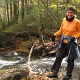 Kim crossing the brook.