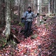 Kim on the foliage covered trail.