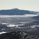 More undercast surrounding Whiteface than earlier.