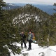 The crew heading back to the false summit.