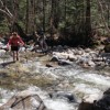 Natalie crossing the brook.